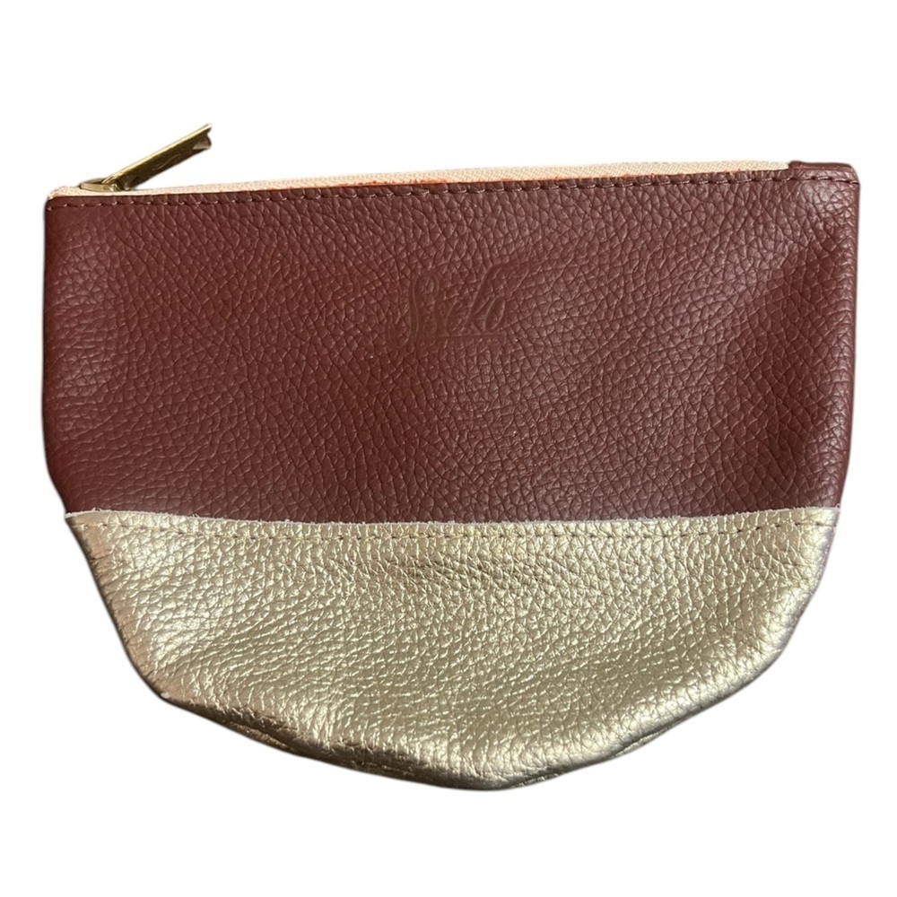 Sseko burgundy and gold leather half moon zip pouch